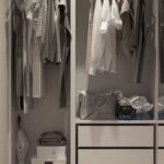 Wardrobe - Assorted Clothes Hanged Inside Cabinet